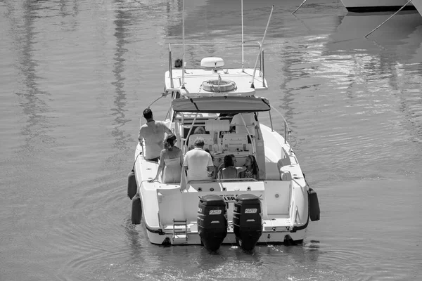 Italy, Sicily, Mediterranean Sea, Marina di Ragusa (Ragusa Province); 25 August 2022, people on a luxury yacht in the port - EDITORIAL