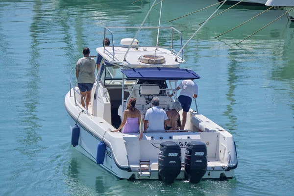 Italy, Sicily, Mediterranean Sea, Marina di Ragusa (Ragusa Province); 25 August 2022, people on a luxury yacht in the port - EDITORIAL