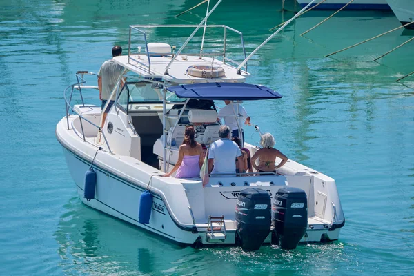 Italy, Sicily, Mediterranean Sea, Marina di Ragusa (Ragusa Province); 25 August 2022, people on a luxury yacht in the port - EDITORIAL