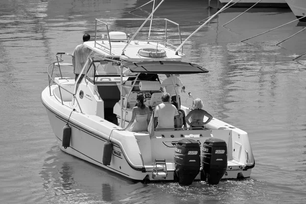 Italy, Sicily, Mediterranean Sea, Marina di Ragusa (Ragusa Province); 25 August 2022, people on a luxury yacht in the port - EDITORIAL