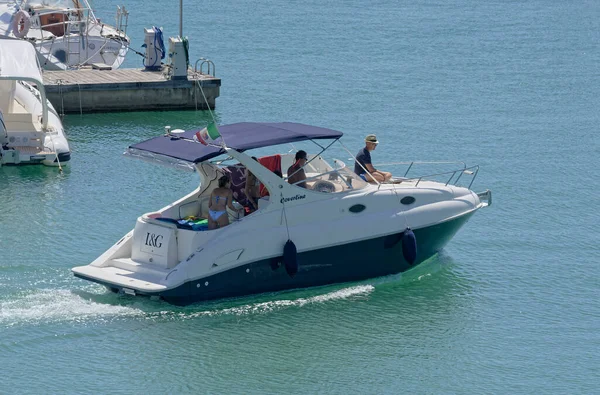 Italy, Sicily, Mediterranean Sea, Marina di Ragusa (Ragusa Province); 27 August 2022, people on a luxury yacht in the port - EDITORIAL