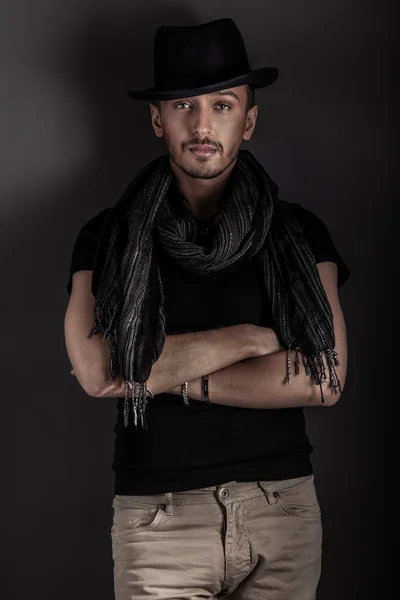 Handsome young guy posing with hat — Stock Photo, Image