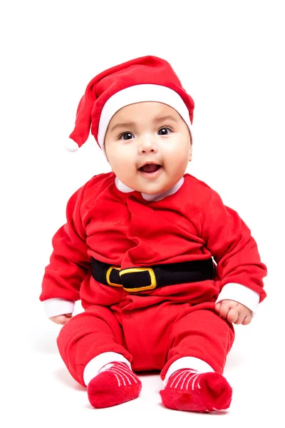 Kleines Mädchen in roter Weihnachtskleidung. — Stockfoto