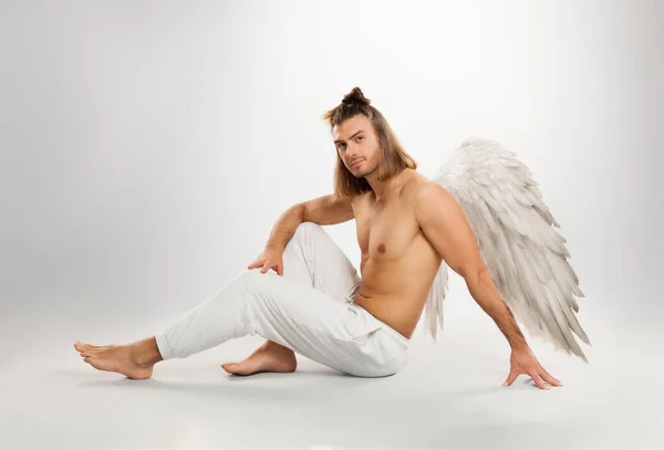 Handsome man angel. Isolated on white background. — Stock Photo, Image