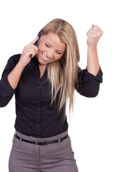 Woman reacting in jubilation to a call — Stock Photo, Image