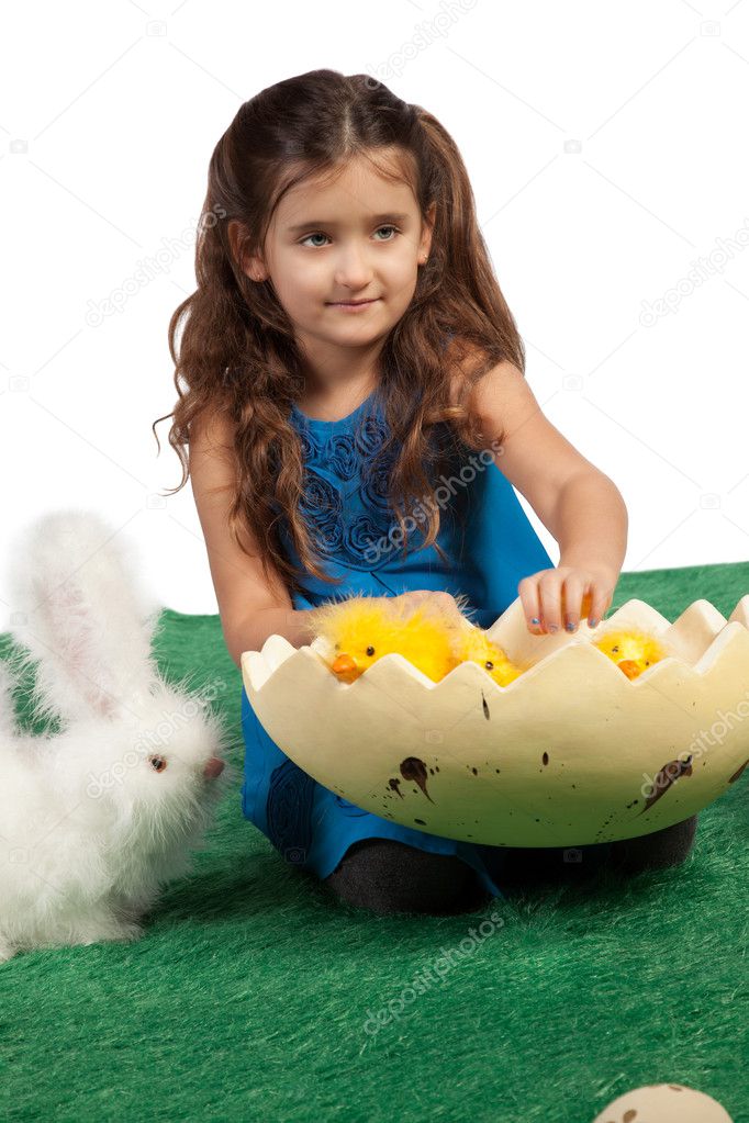 Young girl with egg shape and chicks inside