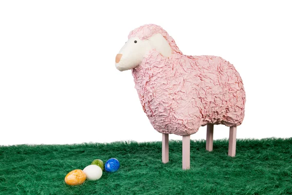 Pink woolly sheep with Easter eggs — Stock Photo, Image