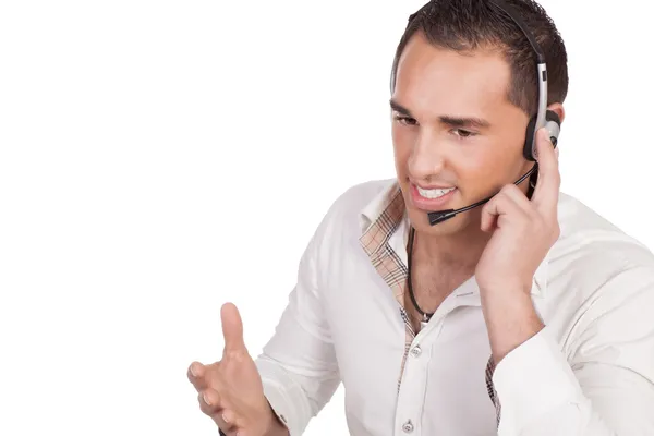 Homem falando sobre um fone de ouvido — Fotografia de Stock