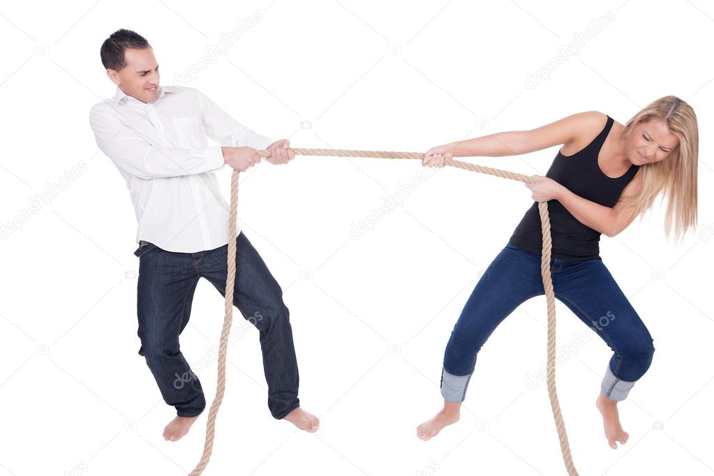 Man and woman having a tug of war