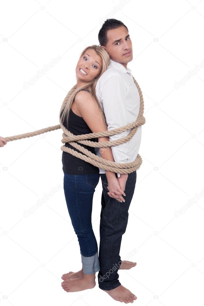Couple bound together by a rope