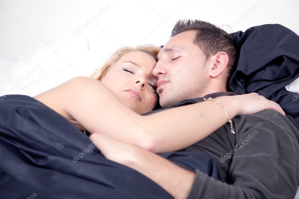 Loving couple in a peaceful sleep