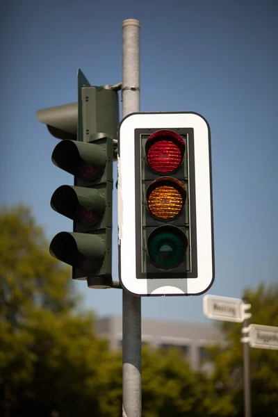 Set of traffic lights showing red and amber — Stock Photo, Image