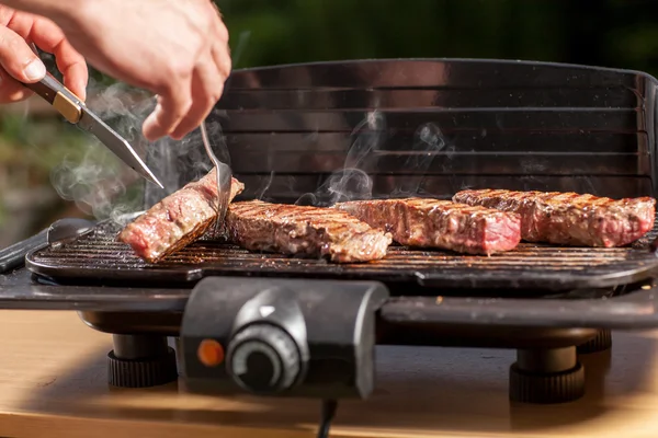 Smoking steak — Stock Photo, Image