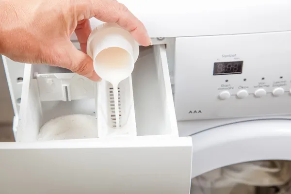 Tvättmaskin förberedelse Stockfoto