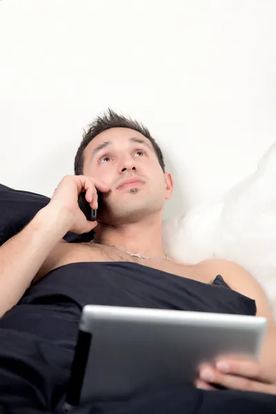 Workaholic in Bed — Stock Photo, Image
