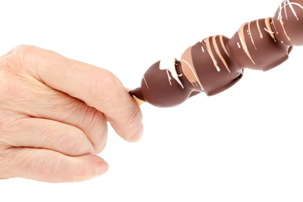 Brown chocolate ball stick — Stock Photo, Image