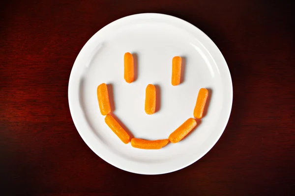 Морква посмішка — стокове фото
