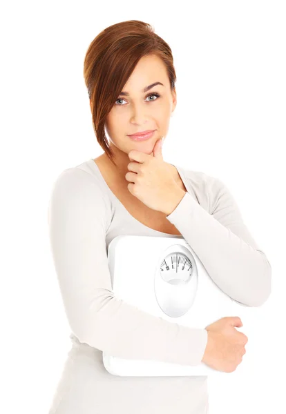 Woman with bathroom scales — Stock Photo, Image