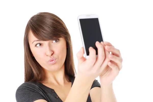 Sending kisses via cellphone — Stock Photo, Image