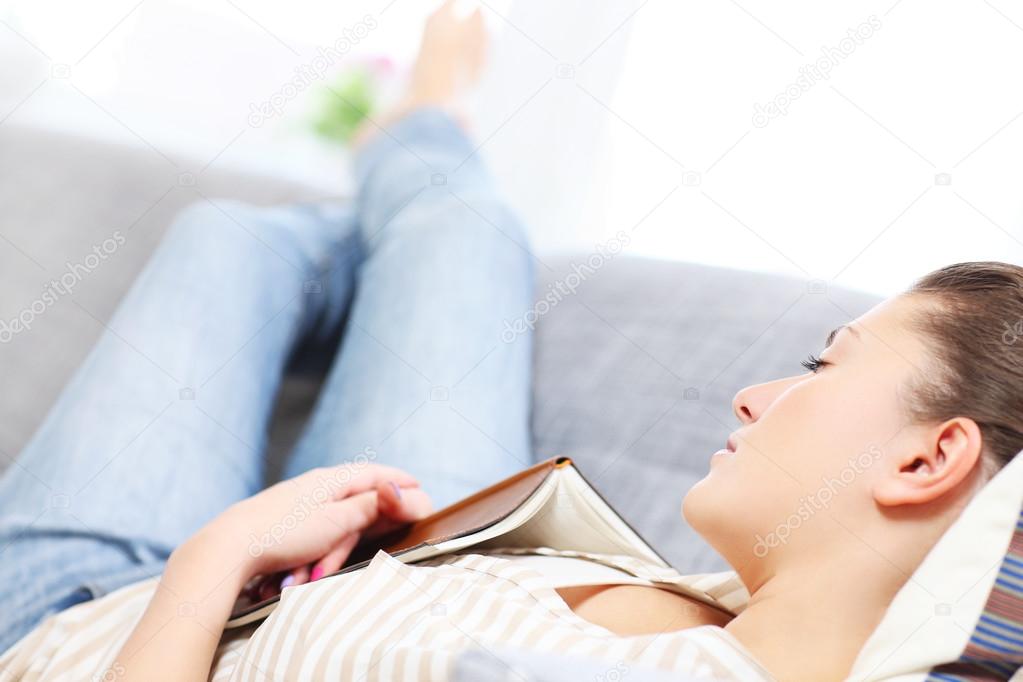 Woman sleeping on a sofa