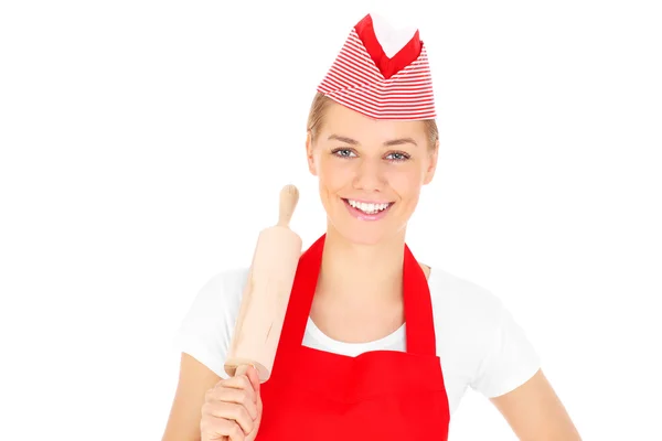 Femme heureuse avec un rouleau à pâtisserie — Photo