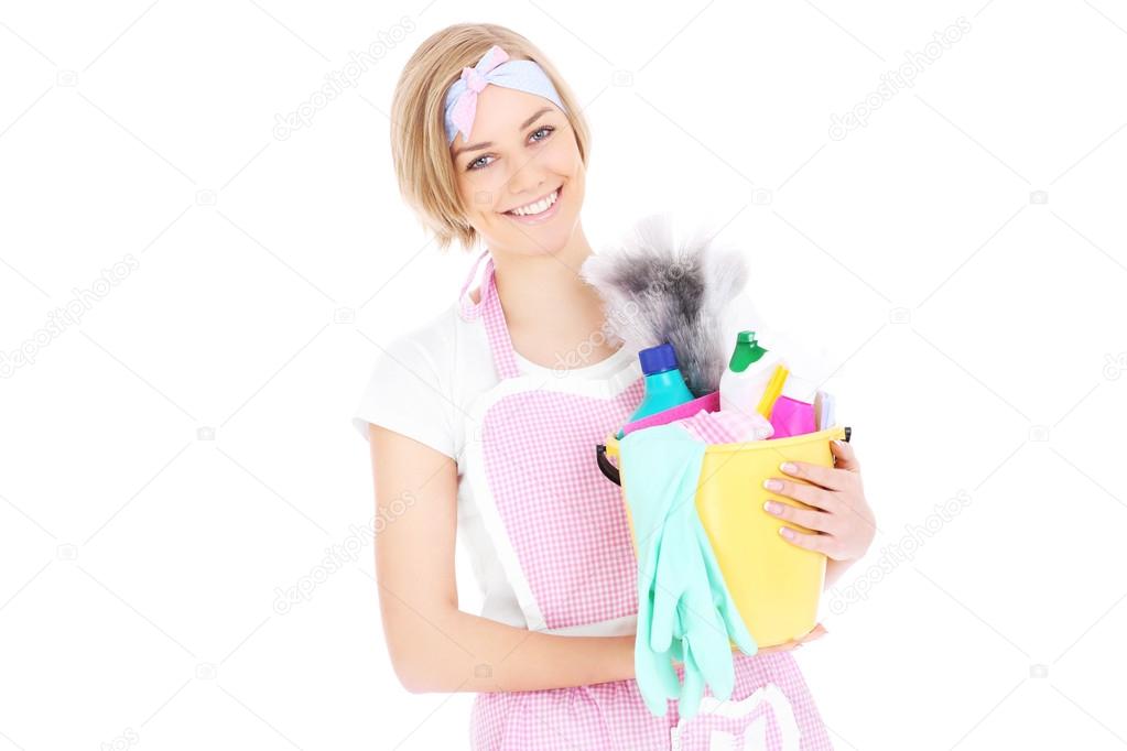 Happy woman with cleaning equipment