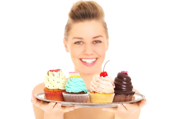 Woman with a tray of caupcakes — Stock Photo, Image