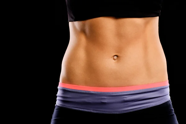 筋肉女性の腹部 — ストック写真
