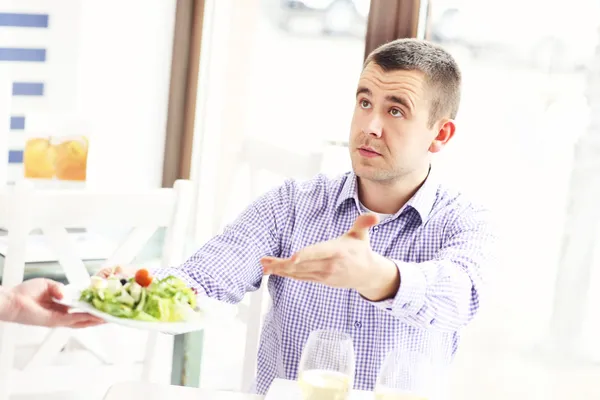 Complaining customer in a restaurant — Stock Photo, Image