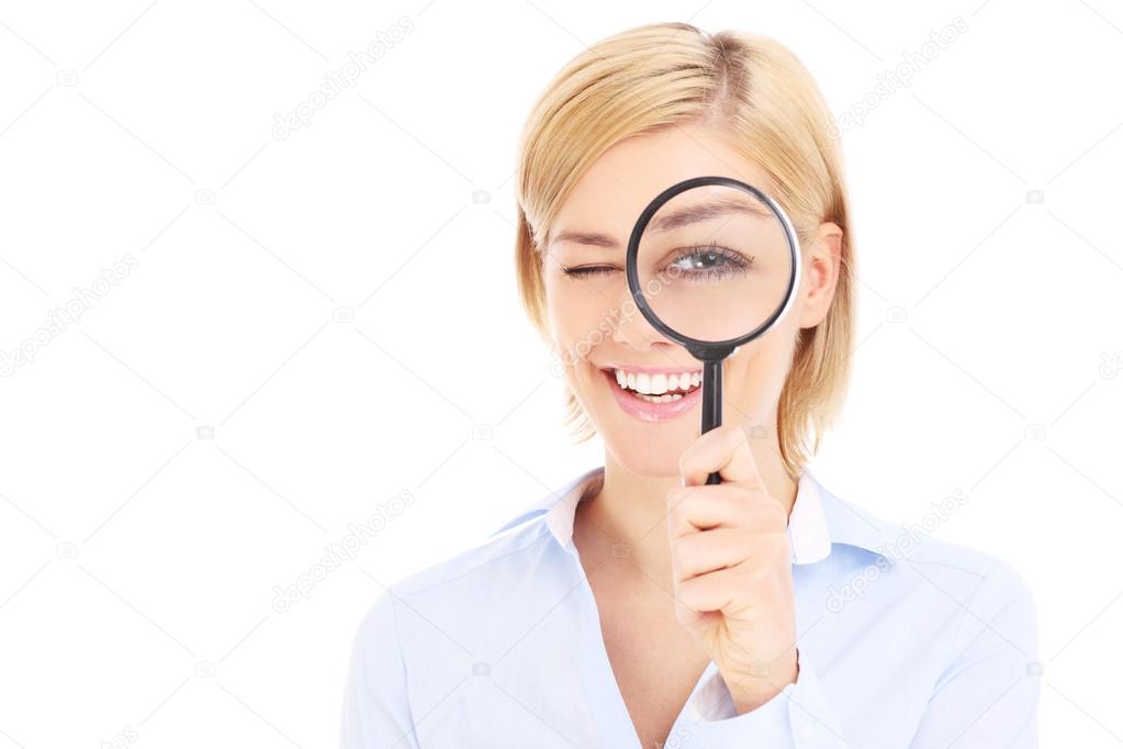 Businesswoman and magnifier