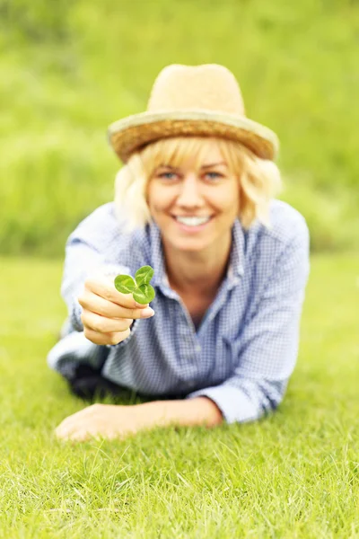 Woman with clover — Stock Photo, Image