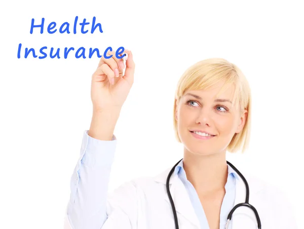 Doctor writing health insurance — Stock Photo, Image