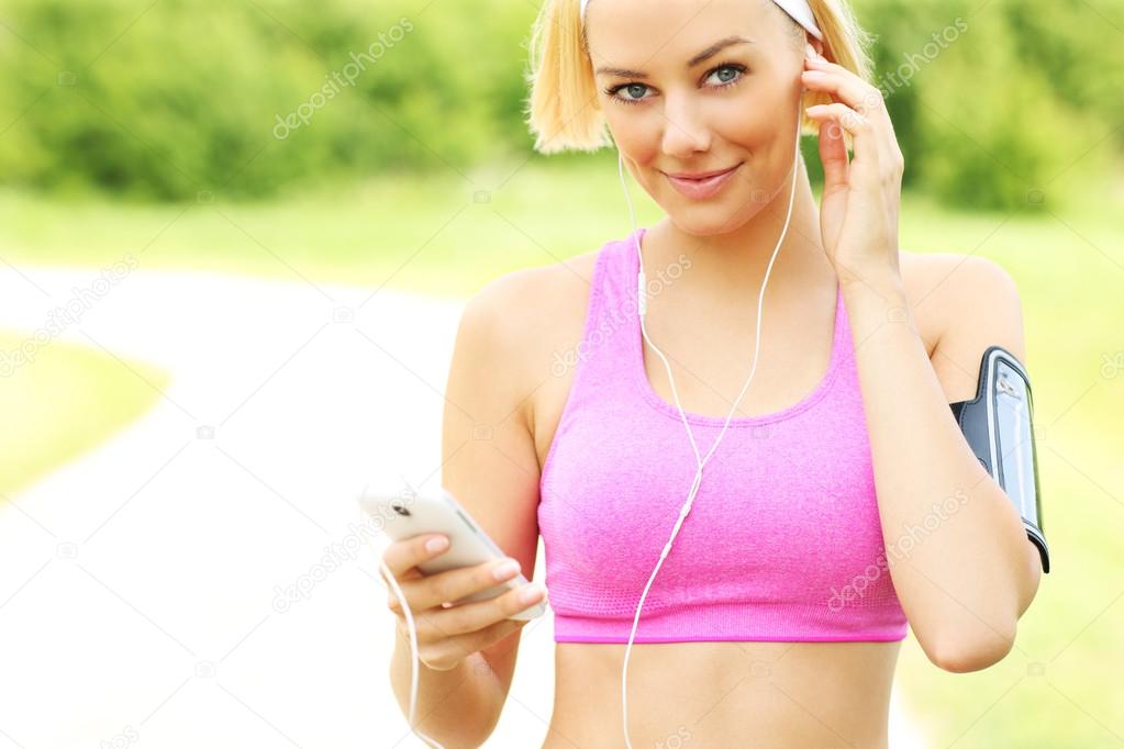 Fit woman with music