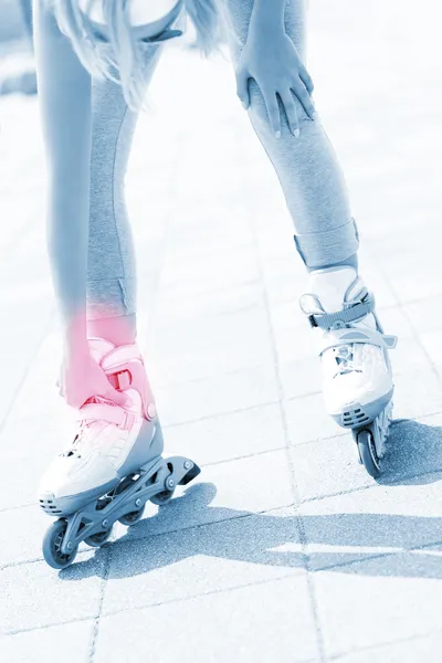 Problem with foot while roller blading — Stock Photo, Image