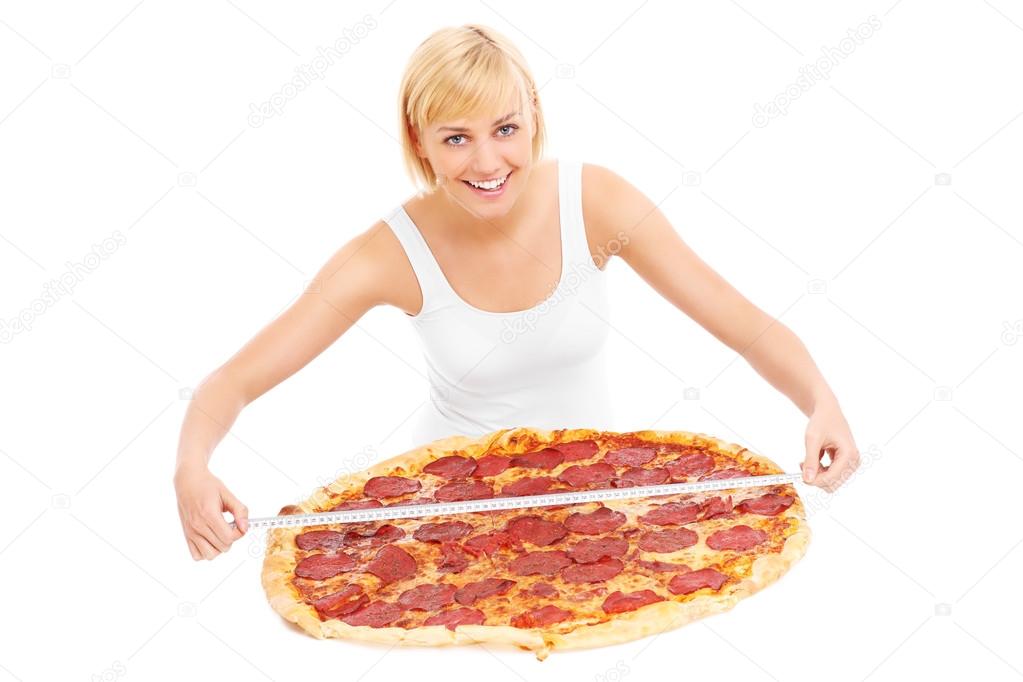 Woman with xxl pizza
