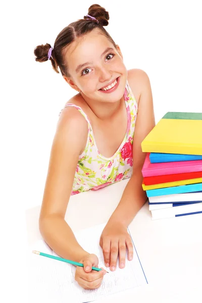 年轻的女孩做作业 — 图库照片