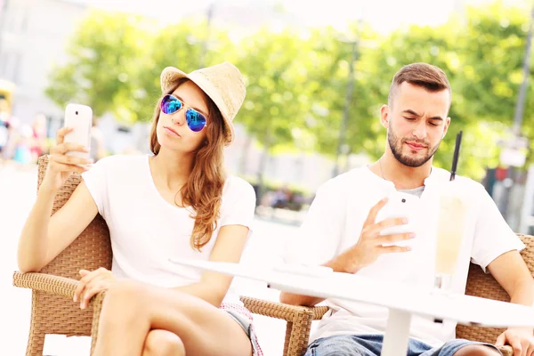 Pareja infeliz en un café — Foto de Stock