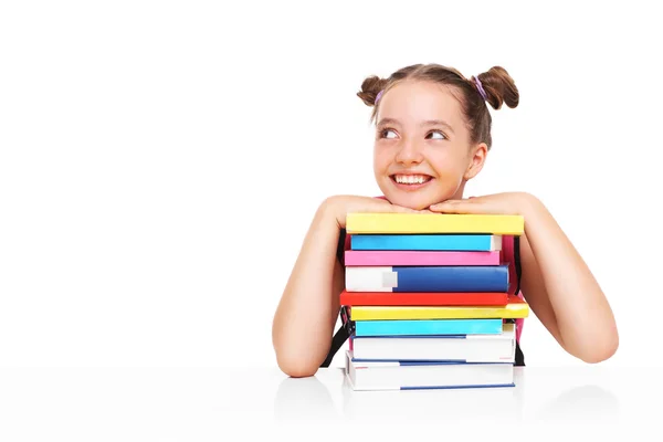 Kleines Mädchen und Bücher — Stockfoto