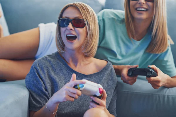 Two girl friends or lgbt couple in living room — Stock Photo, Image