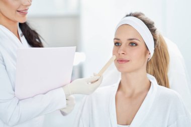 A scene of medical cosmetology treatments botox injection.
