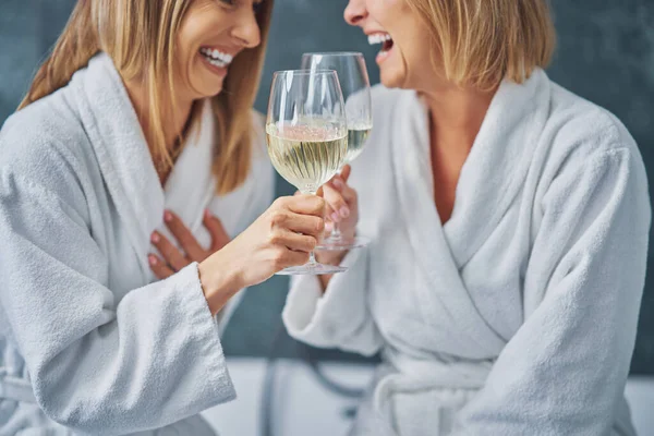 Two girls or couple in bathroom having fun — Stock Photo, Image