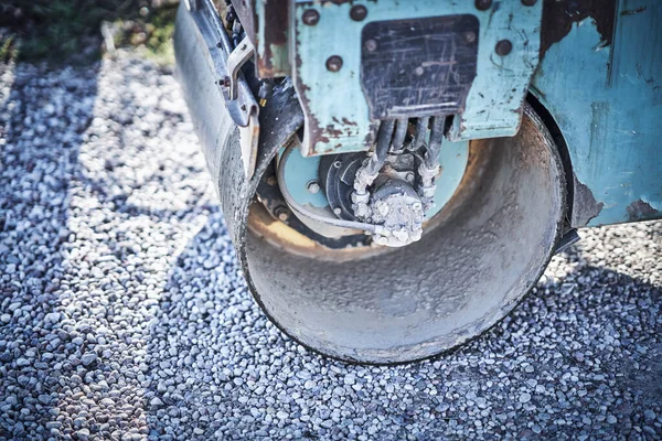 Picture of a road roller machine on the different surfaces — Stockfoto