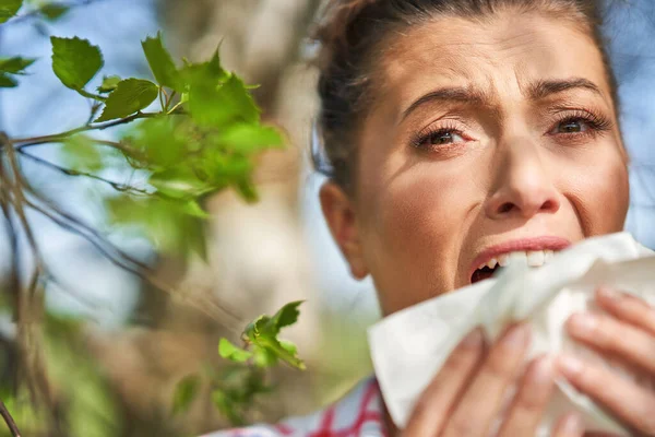 Young woman having allergic symptoms with tissue — Stock Photo, Image