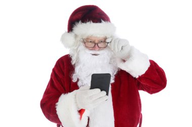 Noel Baba cep telefonunu kullanıyormuş. Noel Baba yoğun sezonunda cep telefonunu mesajlaşmak, mesaj atmak ve telefona cevap vermek için kullanır. Noel Baba Teknolojiyi Seviyor. Mutlu noeller. İyi tatiller..