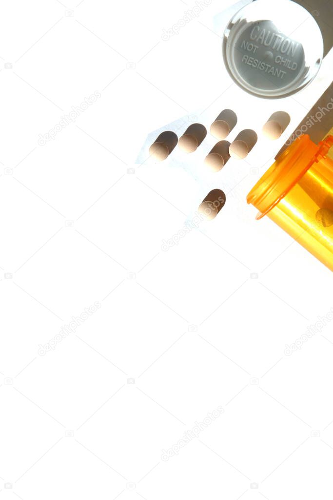 Medication. Pills. Medicine Isolated on white. Note Pad with pill bottle and pills isolated on white. Room for text. Room for images. Prescription Pad. Note Pad. 