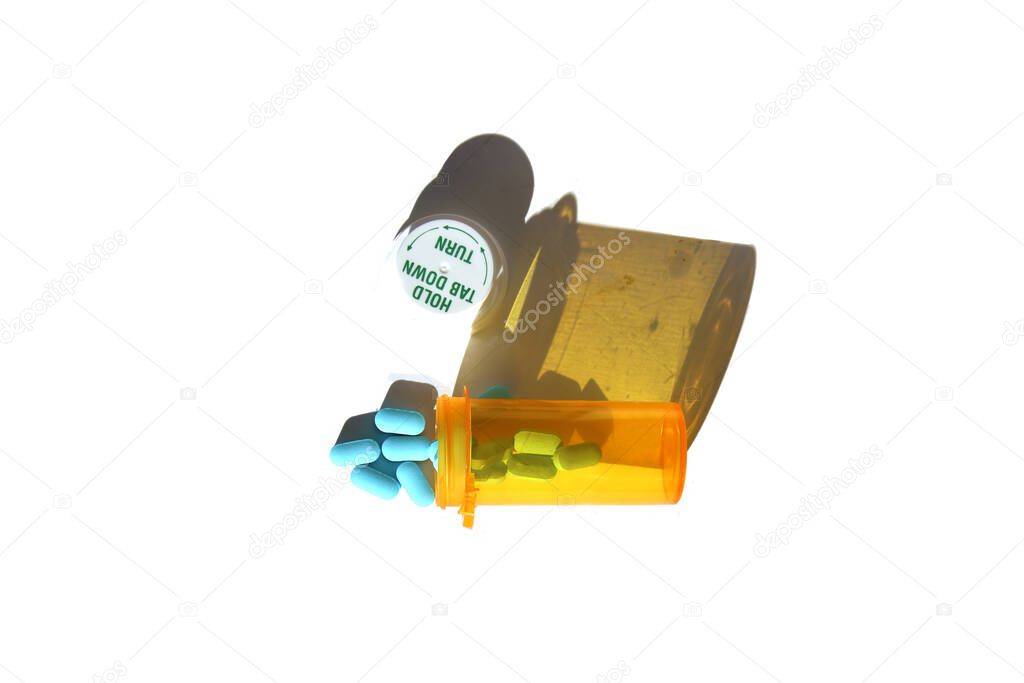 Medication. Pills. Medicine Isolated on white. Note Pad with pill bottle and pills isolated on white. Room for text. Room for images. Prescription Pad. Note Pad. 