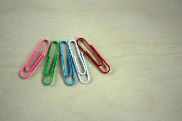 Wooden Surface Should Paper Clips Red Blue Green Pink White — Stock Photo, Image