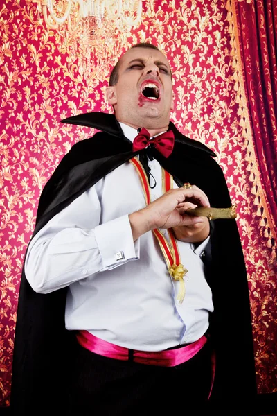 Portrait of a man with Count Dracula style make-up. Shot in a studio. — Stock Photo, Image