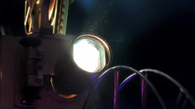 A movie projector is an opto-mechanical device for displaying motion picture film
