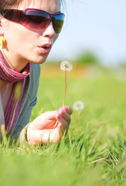 Young girl relaxing on a meadow — Stock Photo, Image